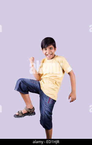 1 indian child boy Cheer Victory Stock Photo