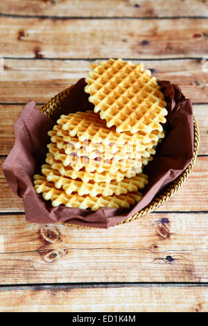 Crispy waffles at basket on a boards Stock Photo