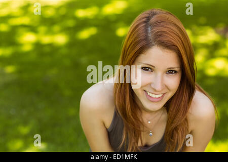 Portrait of a pretty redhead smiling Stock Photo