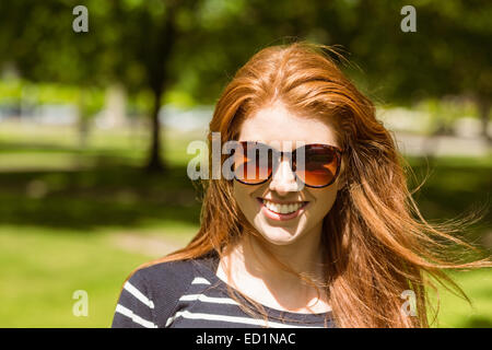 Beautiful young woman wearing sunglasses Stock Photo