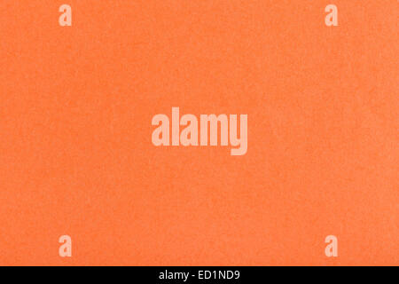 background from sheet of dark orange color fiber paper close up Stock Photo