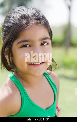 1 indians Beautiful Child girl park enjoy Stock Photo