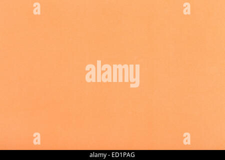 background from orange brown color paper close up Stock Photo