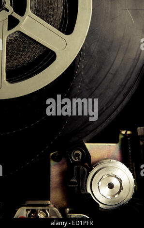 Old 8mm Film Projector over wooden table and textured background Stock  Photo by ©tomert 76314041