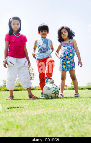 indians children park playing Football Stock Photo