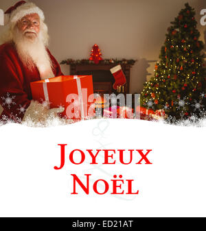 Christmas eve traditions Santa Claus delivering presents to a house and taking gifts from his Stock Photo - Alamy