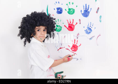 1 indian child boy wall Color Painting Stock Photo