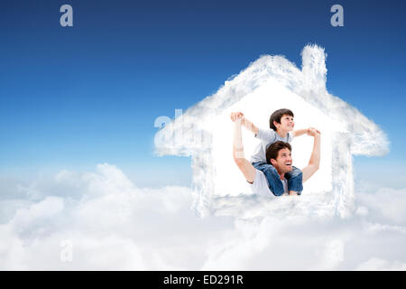 Composite image of attractive father giving a piggyback to his son Stock Photo