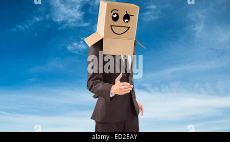 Composite image of anonymous businessman offering his hand Stock Photo