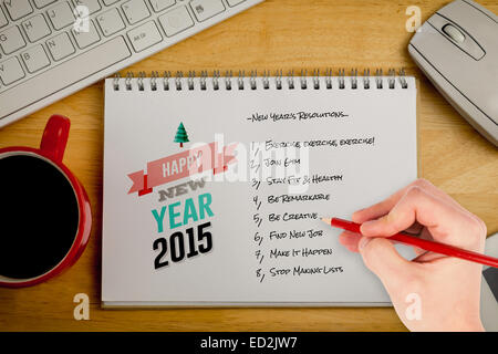 Composite image of hand writing with a pencil Stock Photo