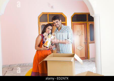 2 indian married couple Home Shifting Stock Photo