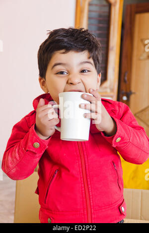 1 indian child boy home Drinking milk Stock Photo