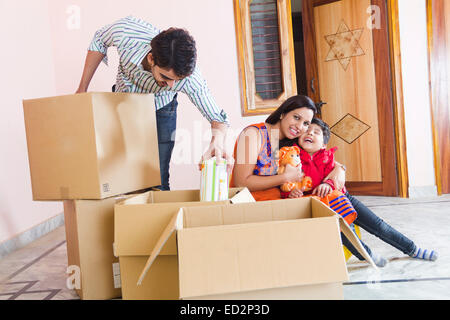indian Parents and son Home Shifting Stock Photo