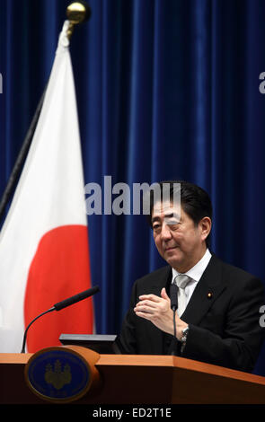Tokyo, Japan. 24th Dec, 2014. Shinzo Abe, Japan's prime minister, gestures as he speaks during a news conference at the prime minister's official residence in Tokyo, Japan, on Wednesday, Dec. 24, 2014. Credit:  Tomohiro Ohsumi-Pool/Jana Press/ZUMA Wire/Alamy Live News Stock Photo