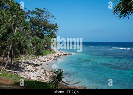 Melanesia, Papua New Guinea, Bismarck Sea, Tuam Island. Scenic view of island coastline. Stock Photo