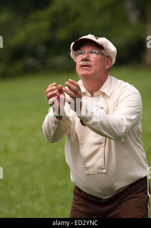 Vintage Base Ball Milwaukee Cream Citys pitcher during a 1860s base ball game in Wisconsin Stock Photo