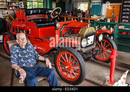 Illinois Dwight,historic highway Route 66,Ambler-Becker Texaco Station 1933,gas,petrol,pump,roadside,senior seniors citizen citizens,man men male,anti Stock Photo