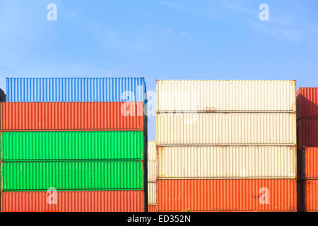 Stack of Cargo Containers at sunrise in an intermodal yard Stock Photo
