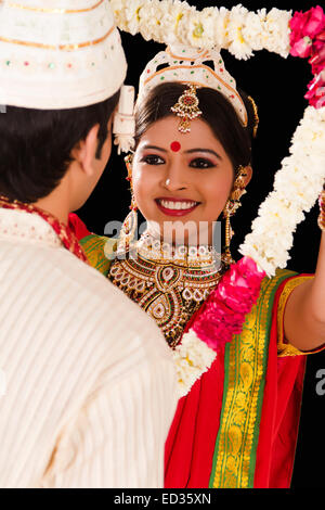 2 Bengali Bridegroom couple Wedding Varmala Stock Photo