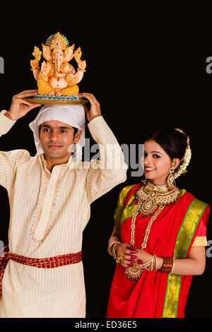 2 Bengali married couple Ganesh Chaturthi Worship Stock Photo