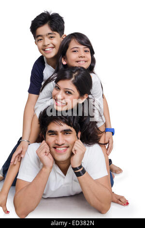 indian Family enjoy Piggyback Stock Photo