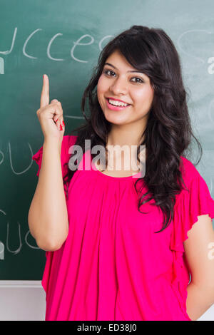 1 indian college girl Classroom showing finger Stock Photo - Alamy