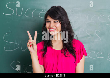1 indian college girl Classroom showing finger Stock Photo
