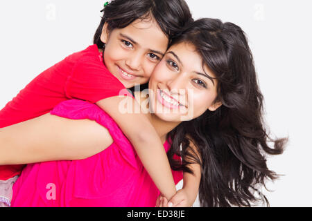 indian mother and daughter Piggyback enjoy Stock Photo