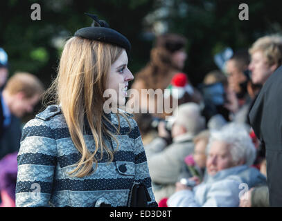 Sandringham, UK. 25th Dec, 2014.  Princess Beatrice attends the Christmas day sevice on the Sandringham Estate Credit:  Ian Ward/Alamy Live News Stock Photo