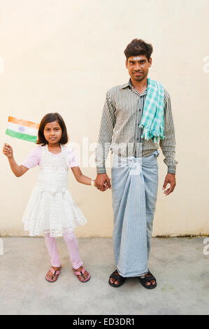 indian rural father and child enjoy Independence Day Stock Photo