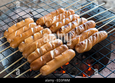 Sausage grill for small party in the garden. Stock Photo
