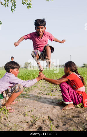 indian rural children playing farm Stock Photo