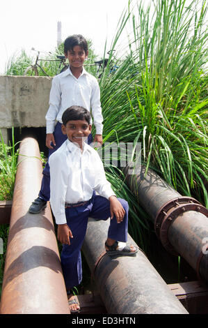 2 indian rural children School Students fun Stock Photo