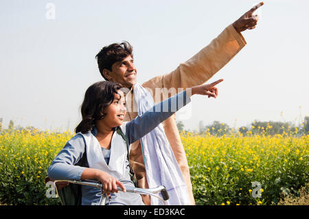 indian farmer and daughter Riding Cycle Stock Photo