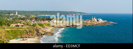 View from the lighthouse at sunny beach, fishing harbour, mosques and church Stock Photo