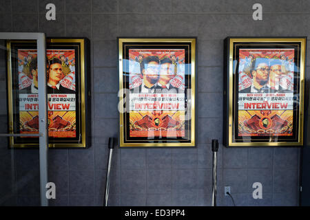 Merrick, New York, USA. December 25, 2014. The Interview, the controversial comedy by Sony Pictures Entertainment, plays at Merrick Cinemas, the only movie theater showing it in Nassau County, Long Island, on Christmas Day. In November, hackers hacked Sony Pictures computers, and later threatened theaters planning to show The Interview, in which characters are recruited by CIA to assassinate North Korea dictator Kim Jong-un.  Credit:  Ann E Parry/Alamy Live News Stock Photo