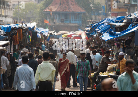 MUMBAI, INDIA - OCTOBER 26, 2012: Shoppers walk in a crowded outdoor market in the Null Bazar neighborhood in the city center. Stock Photo