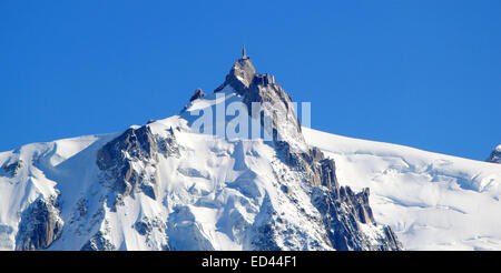 The Aiguille du Midi (3,842 m) is a mountain in the Mont Blanc massif in the Alps with a panoramic viewing platform to Chamonix, Stock Photo