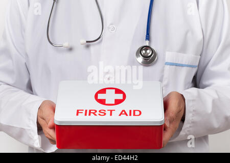 Doctor and first aid kit in his hands Stock Photo