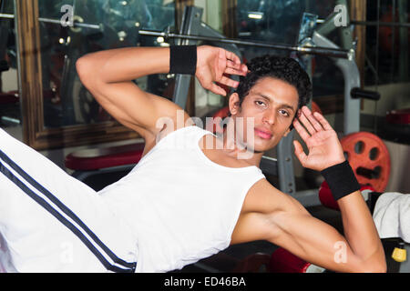 1 indian Sports man Gym Exercising Stock Photo