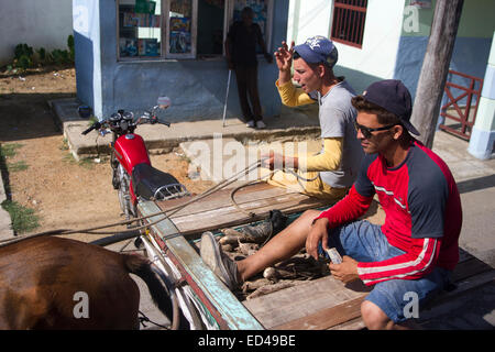 2 men riding donkeys Stock Photo