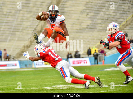 Dallas, Texas, USA. 26th Dec, 2014. Illinois Fighting Illini running back Donovonn Young (5) hurdles over Louisiana Tech Bulldogs cornerback Bryson Abraham (15) at the Zaxby's Heart of Dallas Bowl game between the Illinois Fighting Illini and Louisiana Tech Bulldogs December 26, 2014, during the first half at the Cotton Bowl in Dallas, Texas. Credit:  Cal Sport Media/Alamy Live News Stock Photo