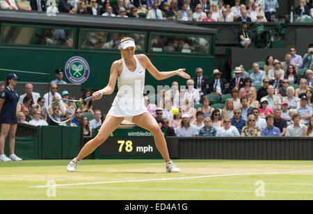 01.07.2014. The Wimbledon Tennis Championships 2014 held at The All England Lawn Tennis and Croquet Club, London, England, UK. Angelique Kerber (GER) [9] (red NCP logo) v Maria Sharapova (RUS) [5] on Centre Court. Maria in action. Stock Photo