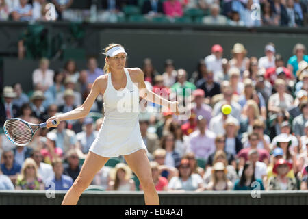 01.07.2014. The Wimbledon Tennis Championships 2014 held at The All England Lawn Tennis and Croquet Club, London, England, UK. Angelique Kerber (GER) [9] (red NCP logo) v Maria Sharapova (RUS) [5] on Centre Court. Maria in action. Stock Photo