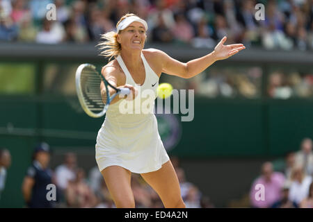 01.07.2014. The Wimbledon Tennis Championships 2014 held at The All England Lawn Tennis and Croquet Club, London, England, UK. Angelique Kerber (GER) [9] (red NCP logo) v Maria Sharapova (RUS) [5] on Centre Court. Maria in action. Stock Photo