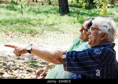 indian Old married couple park enjoy Stock Photo