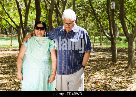 indian Old married couple park enjoy Stock Photo