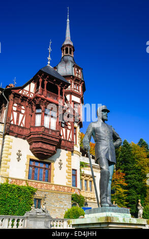 Sinaia, Romania. Carol I statue, king of Romania, in front of Peles Castle, Carpathian Mountains Stock Photo