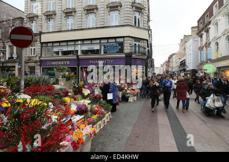 Image of flower stalls on Grafton Street in Dublin city centre as trade booms in the run up to Christmas. Stock Photo