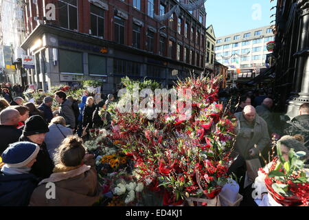 Image of flower stalls on Grafton Street in Dublin city centre as trade booms in the run up to Christmas. Stock Photo